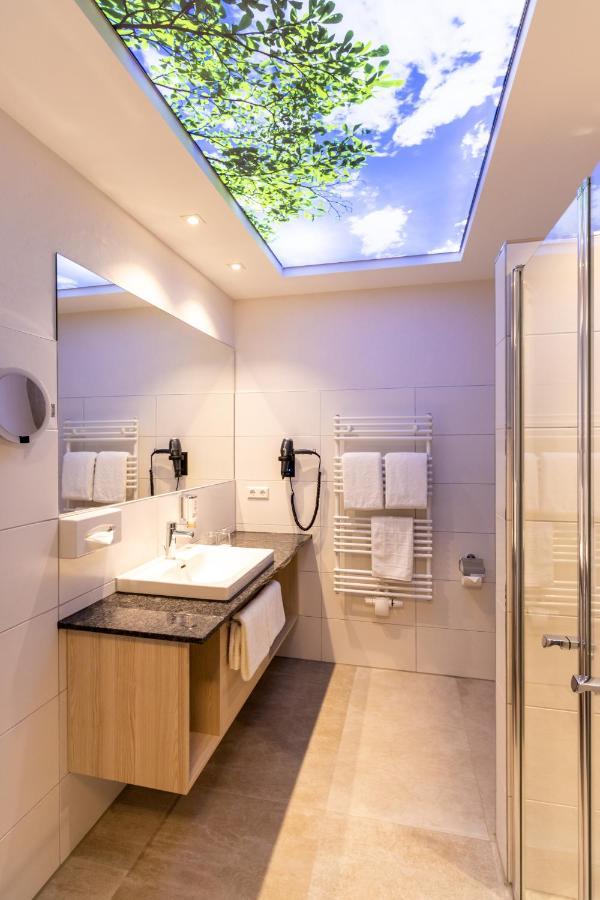 Hotel & Apartments Leugermann อิบเบนบูเริน ภายนอก รูปภาพ