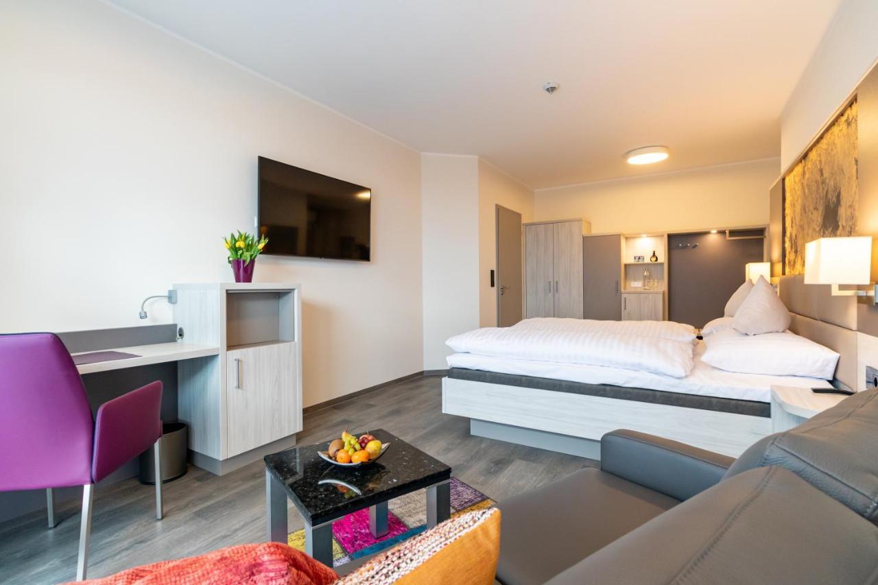 Hotel & Apartments Leugermann อิบเบนบูเริน ภายนอก รูปภาพ