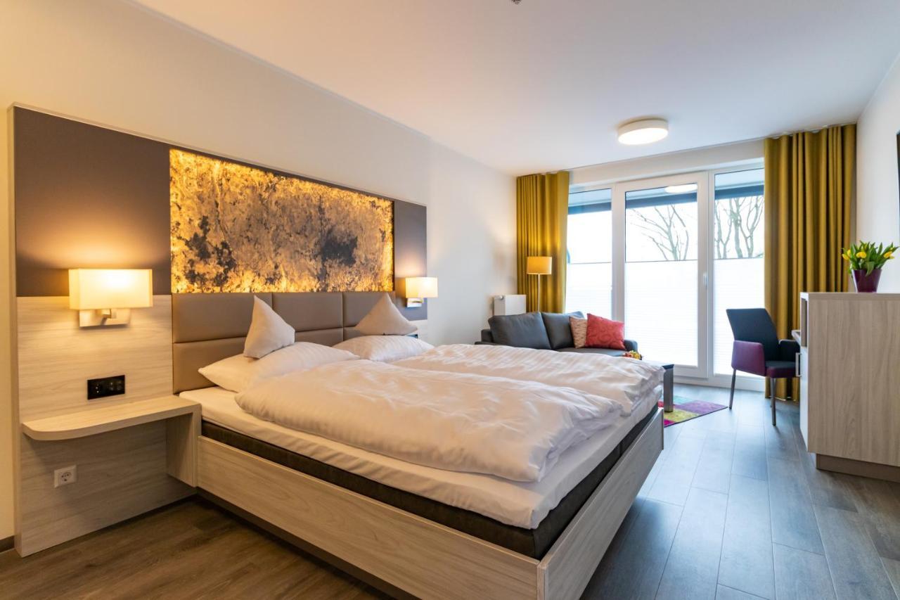 Hotel & Apartments Leugermann อิบเบนบูเริน ภายนอก รูปภาพ