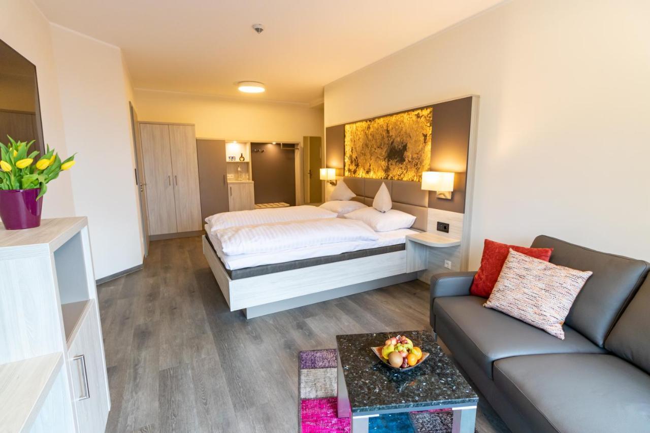Hotel & Apartments Leugermann อิบเบนบูเริน ภายนอก รูปภาพ