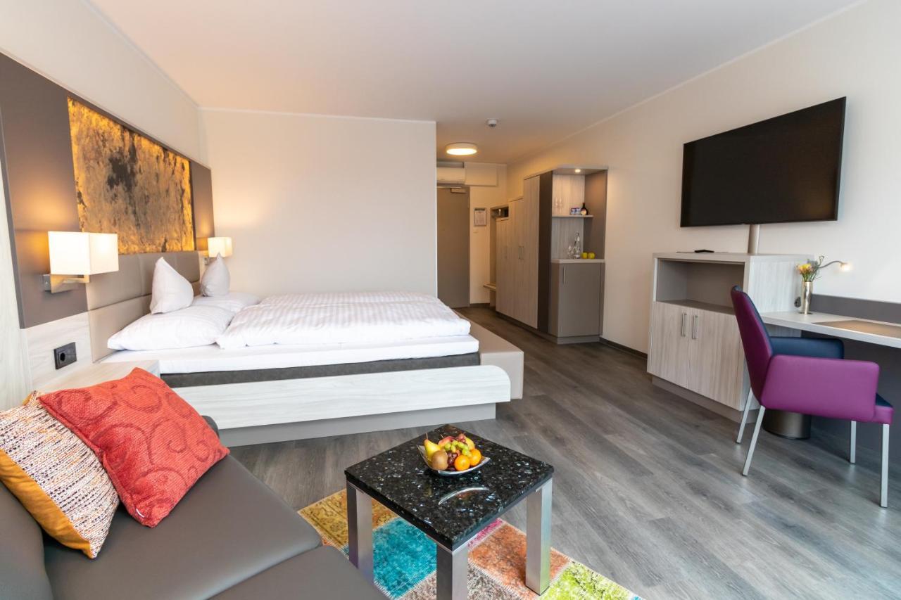 Hotel & Apartments Leugermann อิบเบนบูเริน ภายนอก รูปภาพ